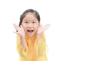 Happy girl is wearing yellow raincoat smile isolated photo