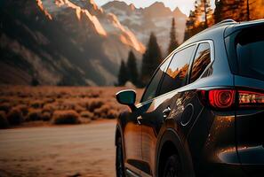 Electric suv cars parked in the view point with mountains in the background. photo