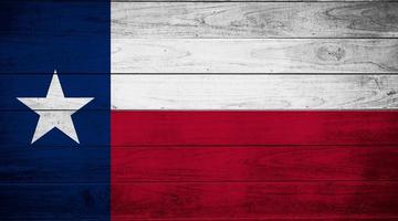 bandera de Texas en de madera antiguo pared foto