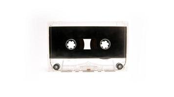 Audio cassette isolated on white background. Isolated retro media. 70's, 80's and 90's music technology. photo