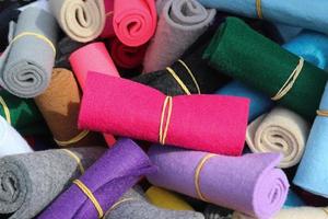 Samples of cloth and fabrics in different colors found at a fabrics market in Germany photo