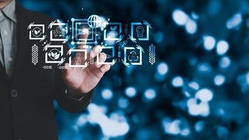 hand touch hologram to save energy,and reduce world warming,climate change,ecology friendly investment,ESG environment social governance,Green Business Innovation and Sustainable Development concept. photo