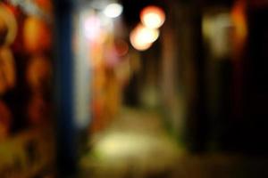 Blurred Dark Desolate Alley with Bokeh Background. photo