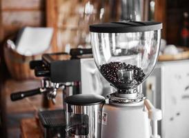 Coffee maker and coffee grinder  in coffee shop photo
