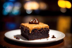 Piece of cake on a white plate on a wooden table. Homemade cake with nuts and honey. photo