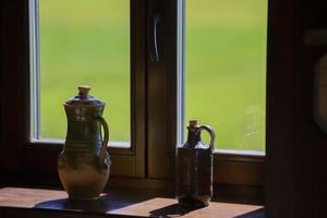 August 29, 2020 Belarus, Gomil. City holiday. Clay pots are on the window. photo