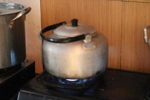 photo of hot kettle on stove