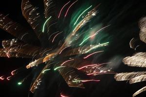 Light spots of green fireworks at a long exposure on a black background. Festive background. photo