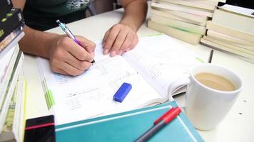 Student studying at desk video