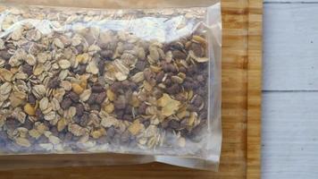 granola Musli in a plastic packet on table video