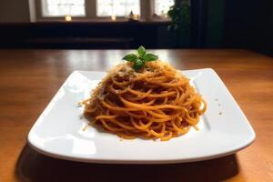 Spaghetti pasta with parmesan cheese and parsley on a plate. photo