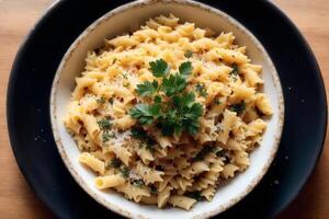 Spaghetti pasta with parmesan cheese and parsley on a plate. photo