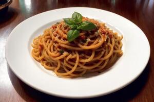 Spaghetti pasta with parmesan cheese and parsley on a plate. photo