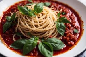 Spaghetti pasta with parmesan cheese and parsley on a plate. photo