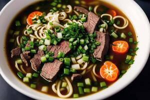 Japanese ramen noodle soup with beef and green onion in bowl. Beef soup. photo