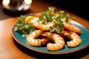 Shrimps with parsley and lemon on a white plate. photo