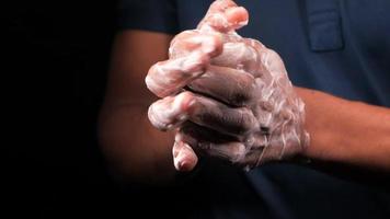 young man washing hand with soap video