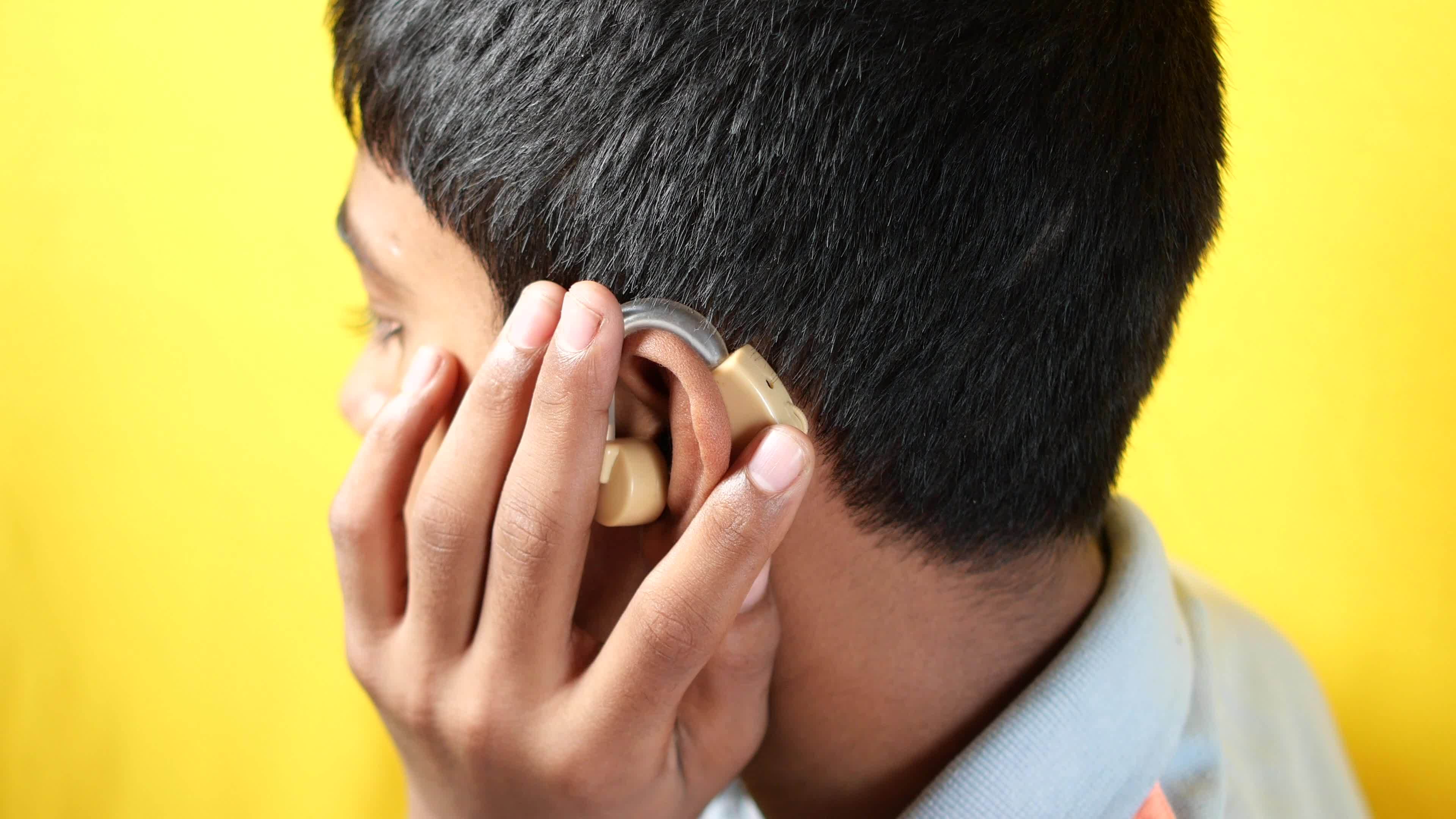 hearing-aid-concept-with-child-with-hearing-problems-22949947-stock