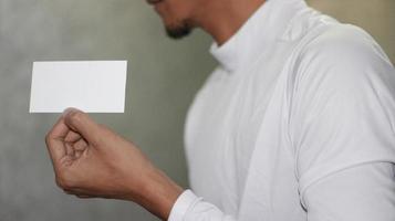 photo of blank white card in hand