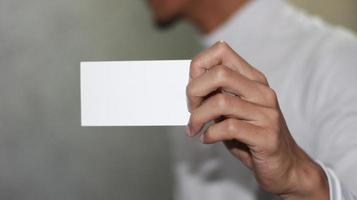 photo of blank white card in hand