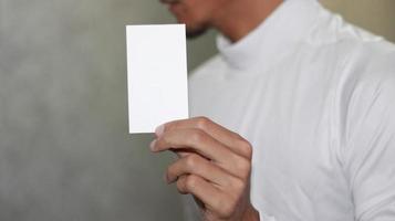 photo of blank white card in hand