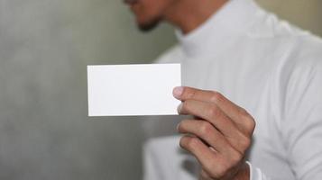 photo of blank white card in hand