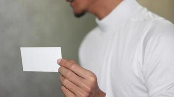 photo of blank white card in hand