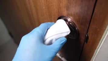 Cleaning door knob with alcohol spray video
