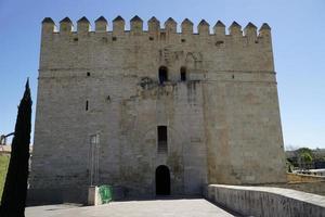 Tower Of Roman Bridge on Guadalquivir River in Cordoba, Spain photo