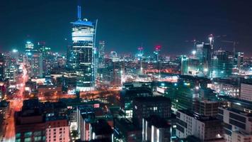 Warsaw, Poland - April 10, 2019. Aerial hyperlapse of Warsaw business center at night- skyscrapers and Palace of Science video
