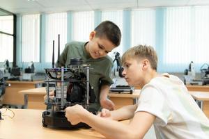 Children using the hand robot technology, Students are studying technology, which is one of the STEM courses. photo