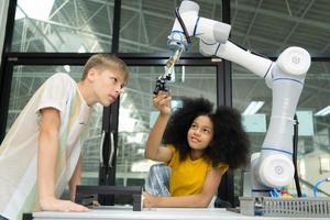 Children using the hand robot technology, Students are studying technology, which is one of the STEM courses. photo