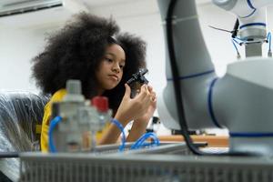 Children using the hand robot technology, Students are studying technology, which is one of the STEM courses. photo