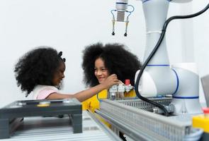 Children using the hand robot technology, Students are studying technology, which is one of the STEM courses. photo