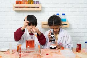 Little boy and girl in science classroom It is the basis for the process of systematic thinking, reasoning, observation, data collection. as well as analysis for processing photo