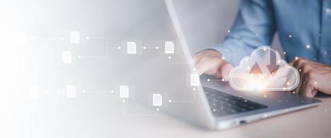 Businessman holding connect to data information on the Cloud Computing Technology Internet Storage Network Concept And a large database big data Through internet technology, Cloud sharing download photo