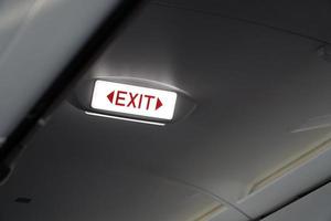 Emergency Exit Sign inside an Airplane photo