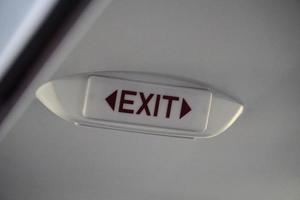 Emergency Exit Sign Inside an Airplane photo