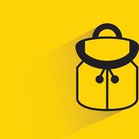 backpack with shadow on yellow background vector