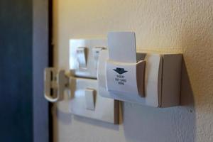 energy saving switch or key card to cut off power for hotels or general residences The power can be cut off immediately when the key card is inserted into the power cut socket. photo