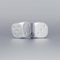 Silver dice on on grey background. Lucky game or random concept. photo