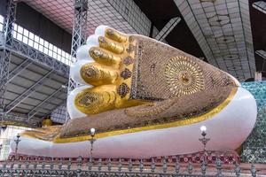 Feet of Shwethalyaung Reclining Buddha at Bago, Myanmar photo