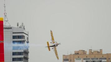 KAZAN, RUSSIAN FEDERATION, JUNE 14, 2019 - Sports light airplane performing aerobatics at the Red Bull competition in Kazan video