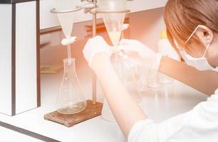 Scientist working in laboratory, testing photo