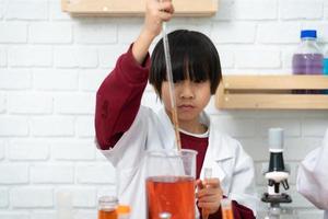 Little boy in science classroom It is the basis for the process of systematic thinking, reasoning, observation, data collection. as well as analysis for processing photo