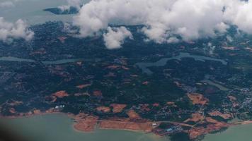 Scenic view from the airplane window to Malaysia. Approach, landing to Singapore video