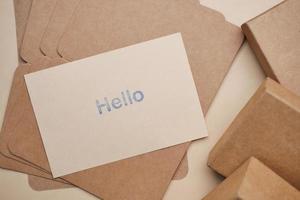 close up of hello text in blue color on a envelope photo