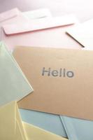 close up of hello text in blue color on a envelope photo