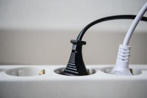 Electrical switch and plug on table photo