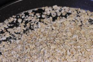 Rolled oats background. Organic diet cereal healthy food photo